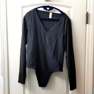 NWOT compression fitted long sleeve bodysuit